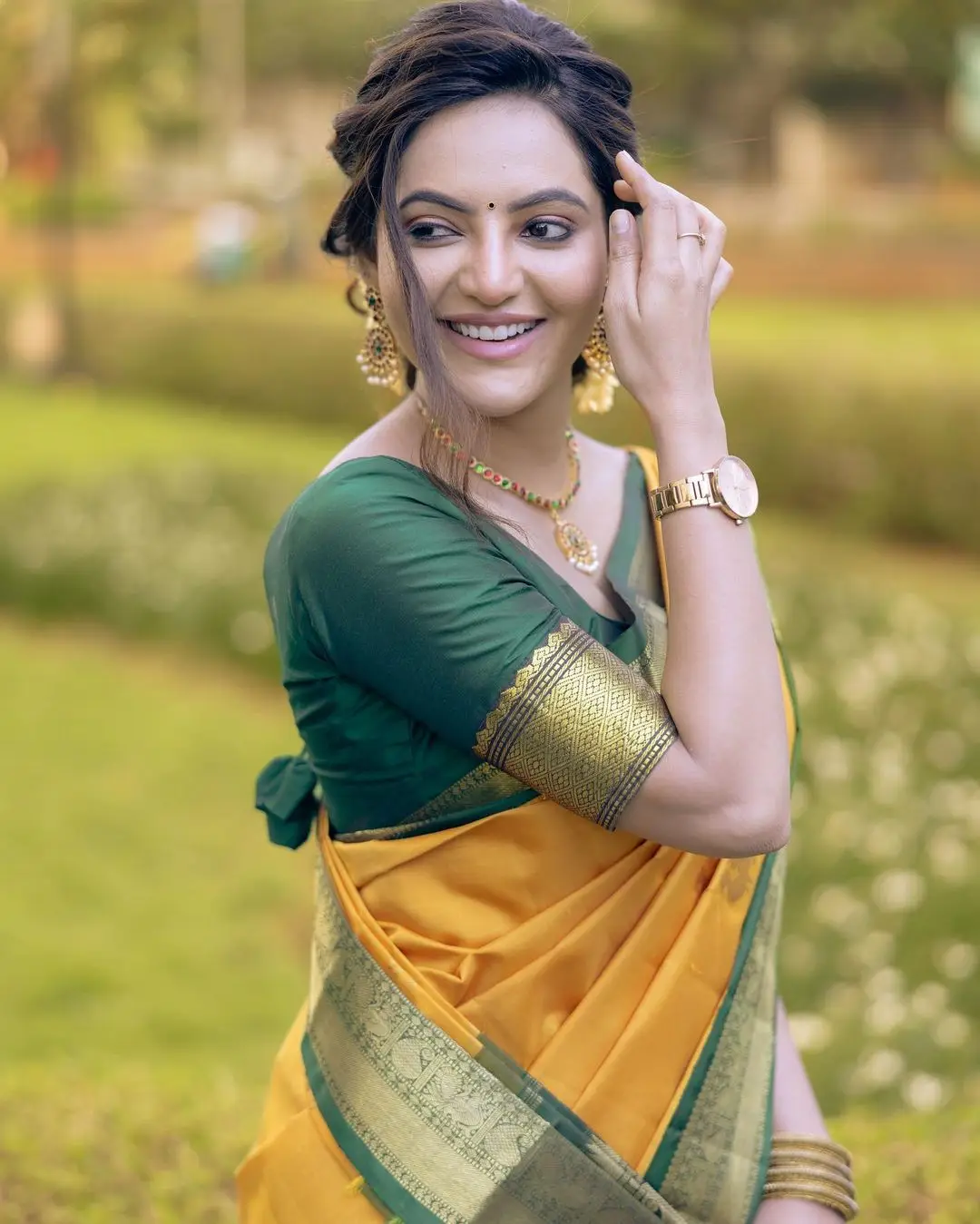 Athulya Ravi in Beautiful Earrings Jewellery Yellow Designer Saree Green Blouse